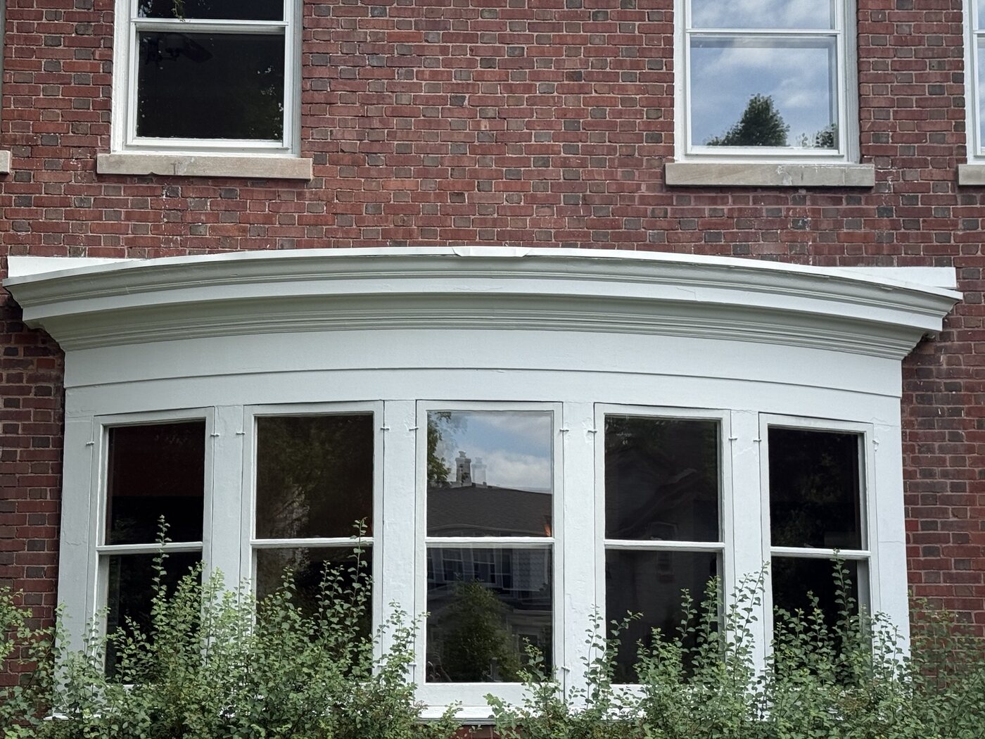 Custom curved bay-window metal work