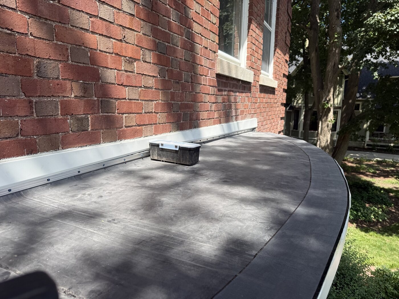 Completed low-slope membrane roof